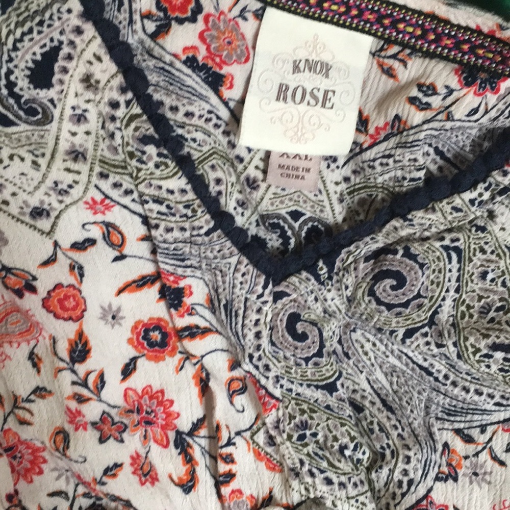 A floral dress never worn